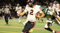 Hart Hawks Qb Jacob Pisano in red and black runs for his 3rd touchdown of the game vs the Canyons Cowboys.