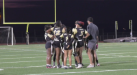 Golden Valley Girls Flag Football team Huddles up before a play.