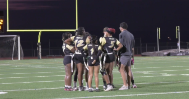 Golden Valley Girls Flag Football team Huddles up before a play.