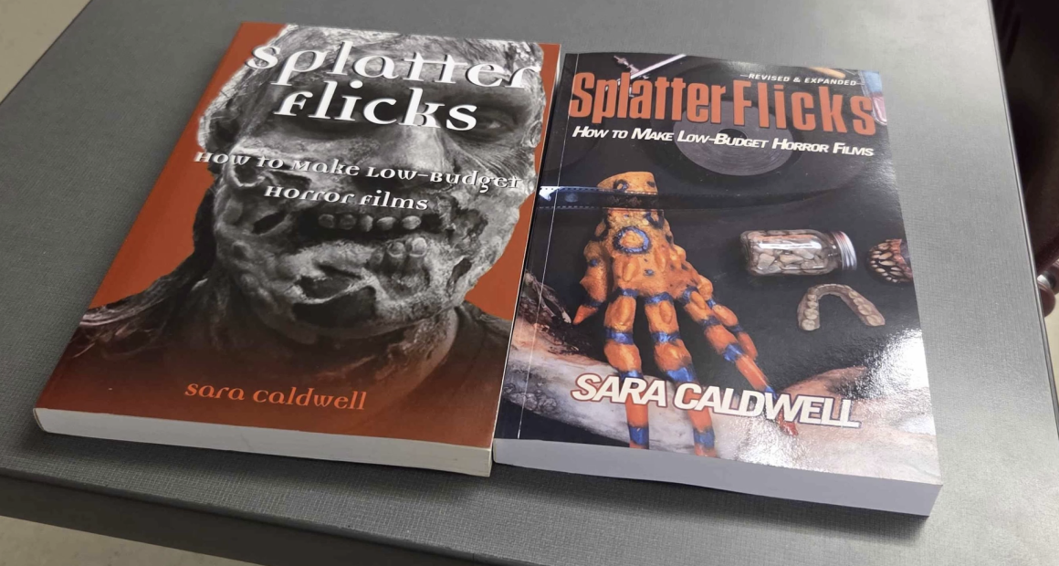Two books titled Splatter Flicks: How to Make Low-Budget Horror Films by Sara Caldwell are placed side by side on a gray surface. The book on the left has a red cover featuring a close-up of a zombie-like face in black and white. The book on the right, labeled “Revised & Expanded,” shows a cover with a monster hand prop, a jar of preserved objects, and prosthetic teeth on a dark background.